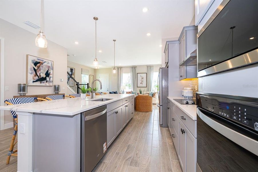 Furnished interior view inside a new home in Serenade at Ovation, Winter Garden (Image 21).