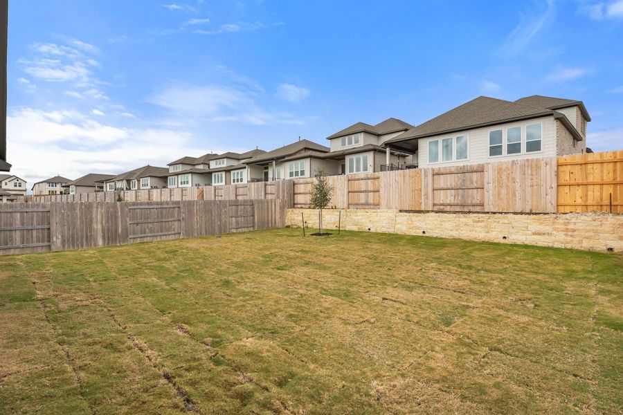 Exterior details and patio area of a home in Lariat, Liberty Hill (Image 29). Exterior details and patio area of a home in Lariat, Liberty Hill (Image 29).