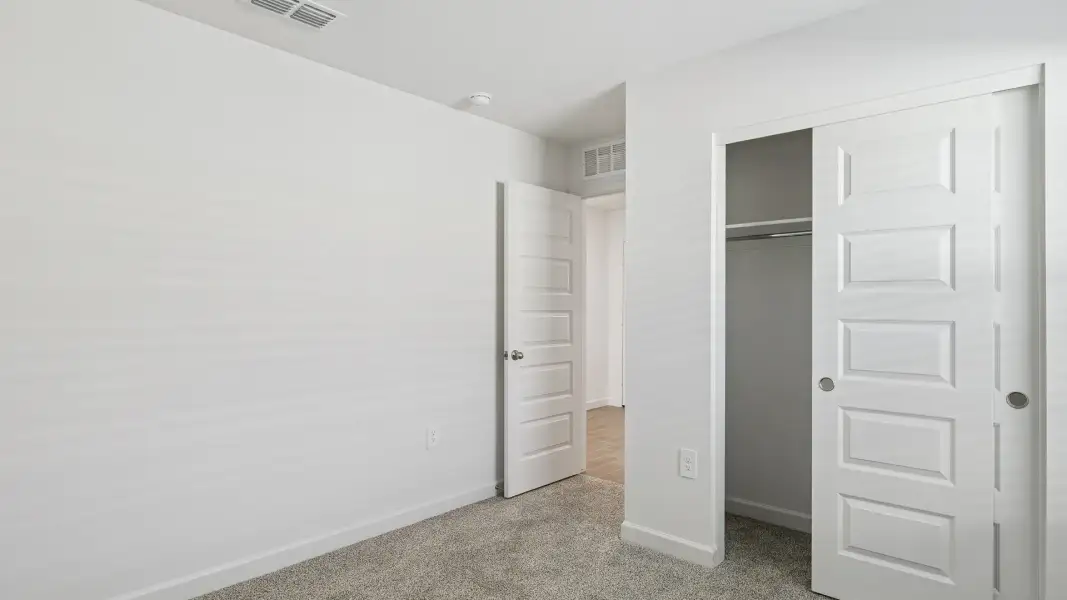 Spacious, unfurnished interior of a new home in Remington, Buckeye (Image 23). Spacious, unfurnished interior of a new home in Remington, Buckeye (Image 23).
