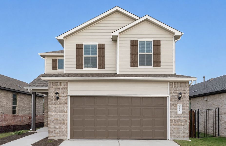 Front exterior of a new home in Saddleback at Santa Rita Ranch, Liberty Hill, TX, highlighting curb appeal (Image 3).