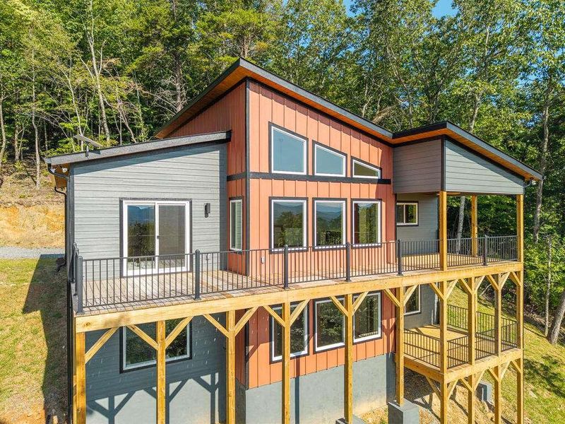 Exterior details and patio area of a home in , Ellijay (Image 29).