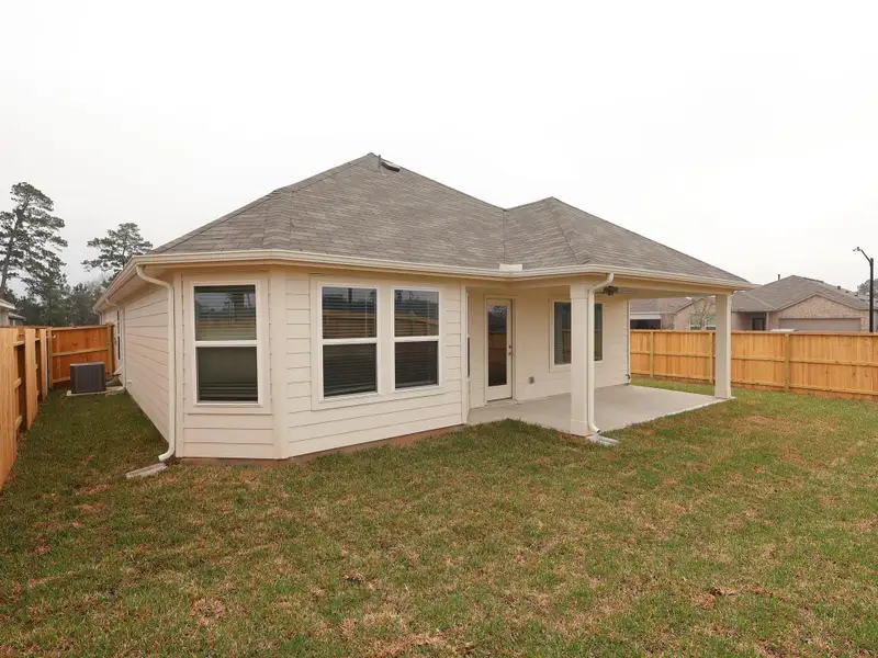 Exterior details and patio area of a home in Moran Ranch, Willis (Image 3).