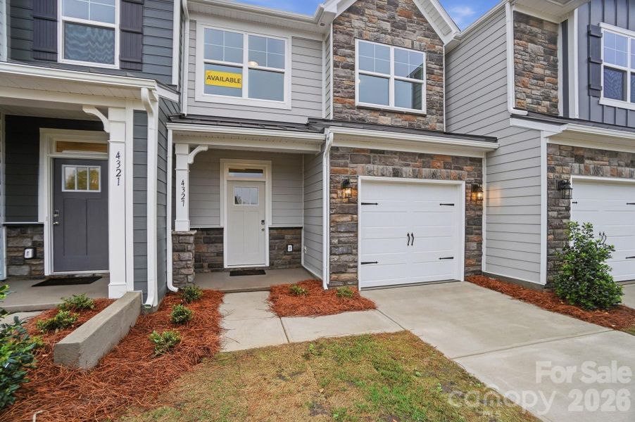 Homesite 208 features an Ashland K floorplan