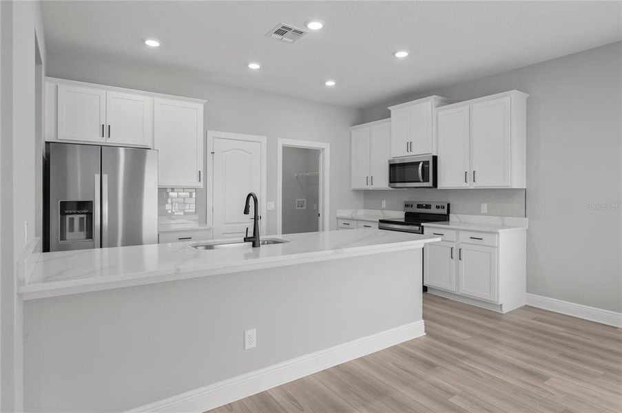 Furnished interior view inside a new home in Gum Lake Preserve, Lake Alfred (Image 11).