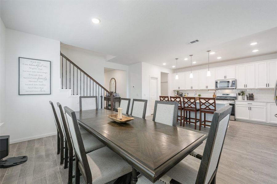 Formal dining opens into the kitchen. Formal dining opens into the kitchen.