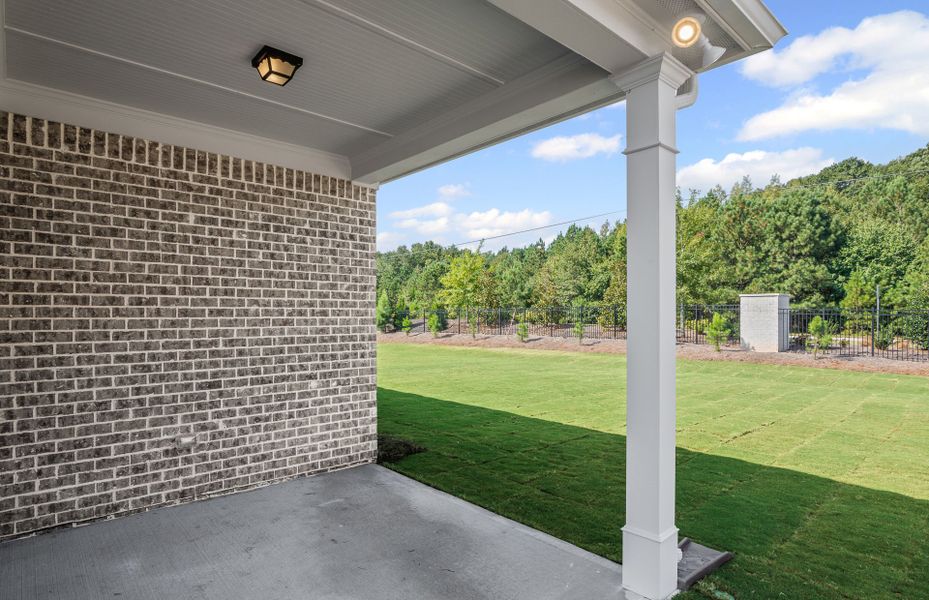 Exterior details and patio area of a home in Overland, Locust Grove (Image 3).