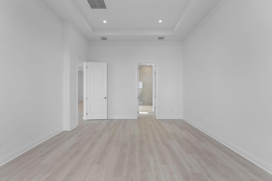 Furnished interior view inside a new home in PGA Village Verano, Port St. Lucie (Image 16).