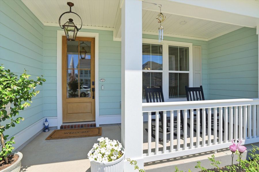 Exterior details and patio area of a home in Tidewater at Lakes of Cane Bay, Summerville (Image 3).