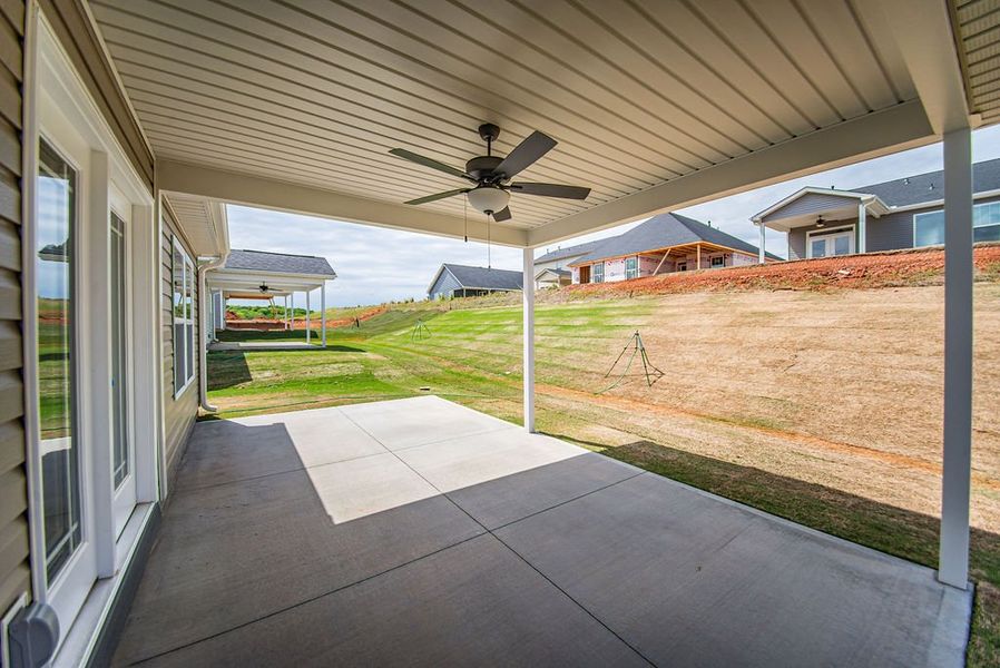 Representative furnished interior of a home built from the Quincy by Enchanted Homes in Hampshire Heights, Moore (Image 29).