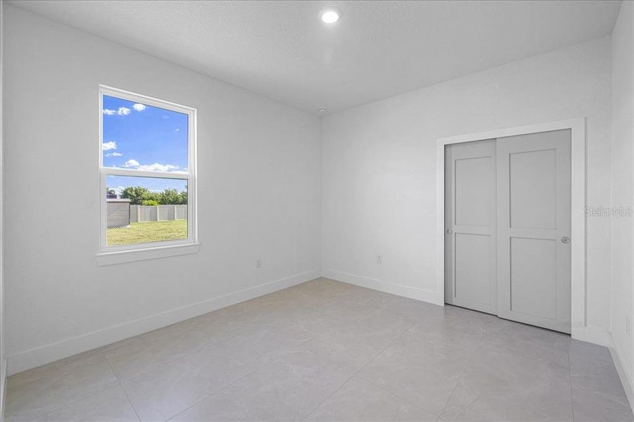 Spacious, unfurnished interior of a new home in , Port Charlotte (Image 34).