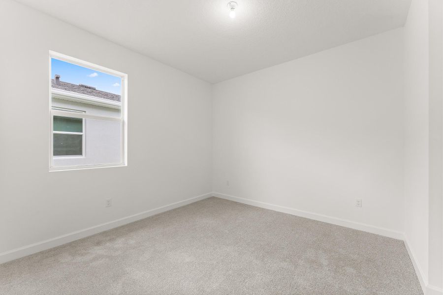 Spacious, unfurnished interior of a new home in Tradition - Cadence, Port St. Lucie (Image 8).