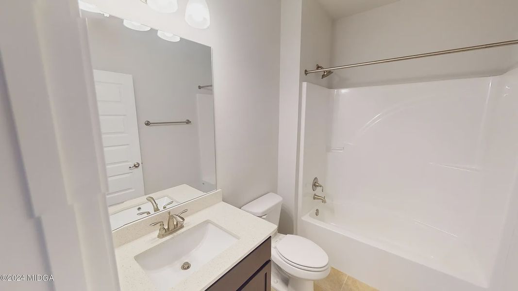 Furnished interior view inside a new home in Oakview Estates, Macon (Image 11).