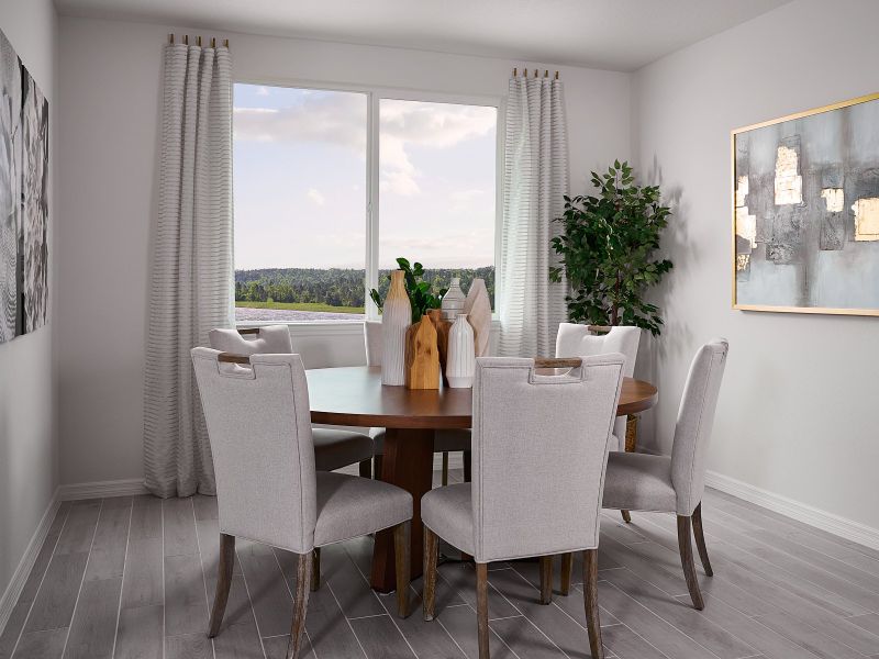 Dining area of the Jasmine floorplan modeled at Salt Meadows.