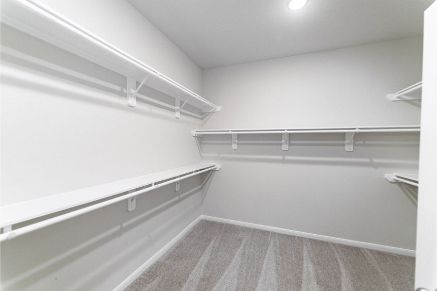 Spacious, unfurnished interior of a new home in Creekhaven, Iowa Colony (Image 13).