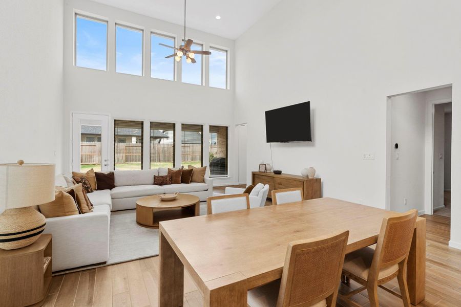 Comprehensive view of the main floor living hub, demonstrating the massive scale and modern design of this Perry Homes masterpiece. Comprehensive view of the main floor living hub, demonstrating the massive scale and modern design of this Perry Homes masterpiece.