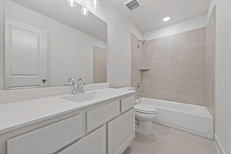 Furnished interior view inside a new home in Bridgeland, Cypress (Image 5).