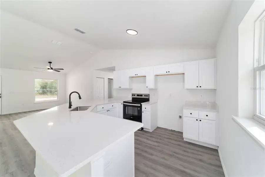 Furnished interior view inside a new home in , Dunnellon (Image 12).
