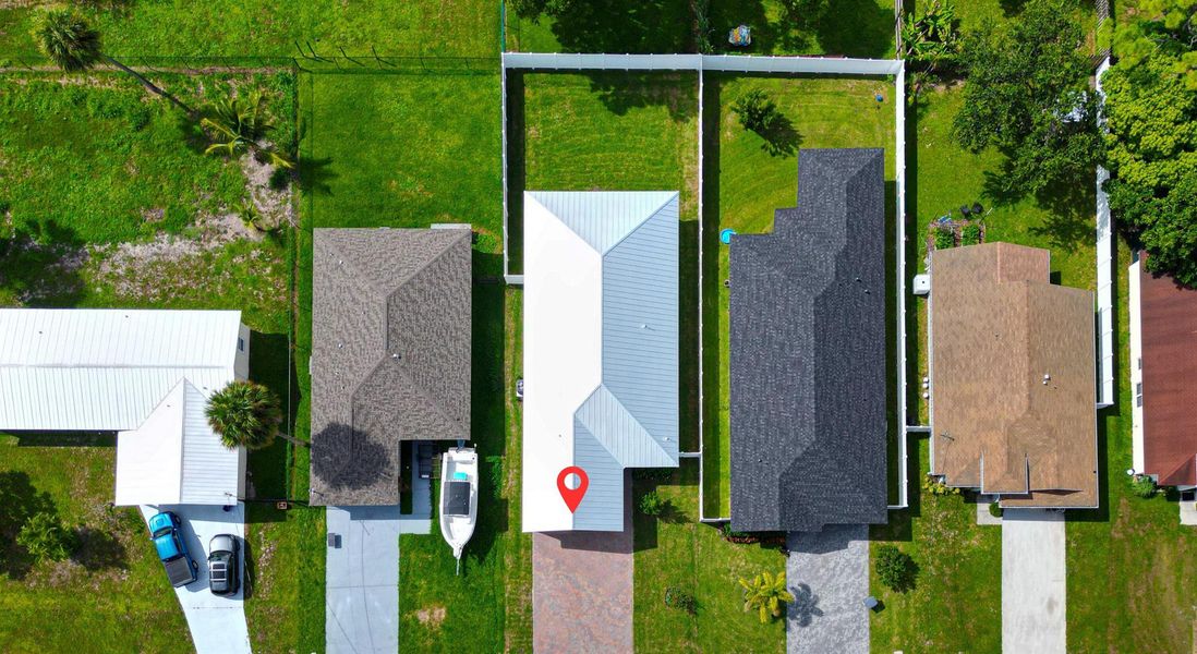 Front exterior of a new home in , Jupiter, FL, highlighting curb appeal (Image 18).