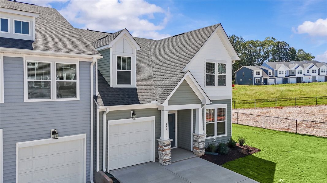 Exclusive end-unit townhome in Aspen Ridge with elegant design and high standards