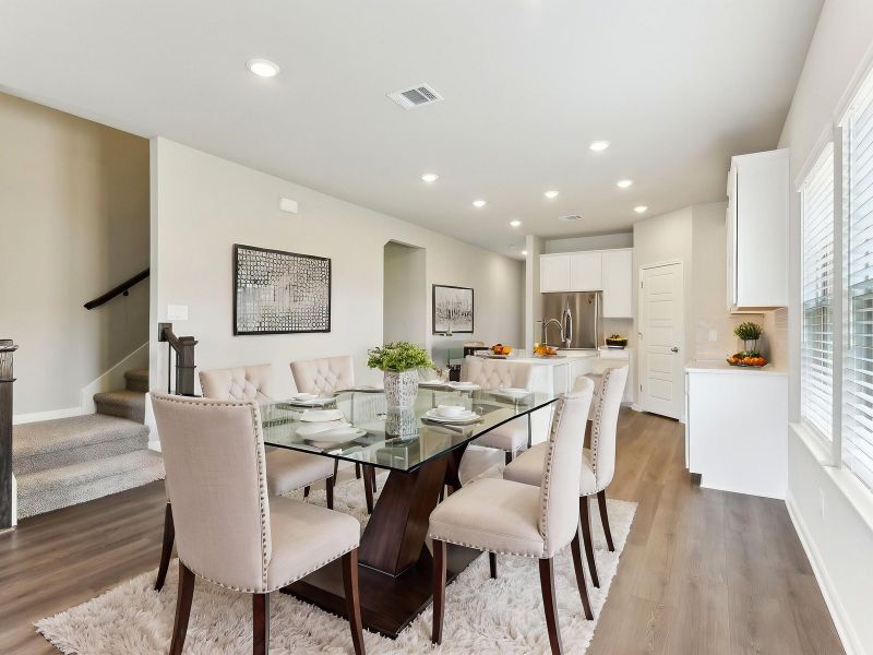Virtually staged dining room in the Matador floorplan at a Meritage Homes community.