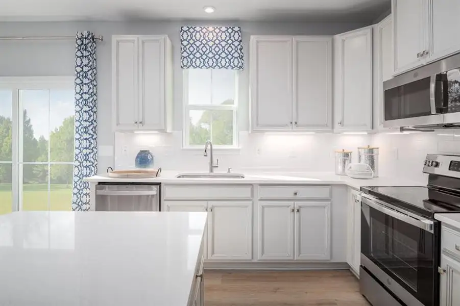 Representative furnished interior of a home built from the Odessa by Ryan Homes in Cedarside Townhomes at Dry Creek, Goodlettsville (Image 3).