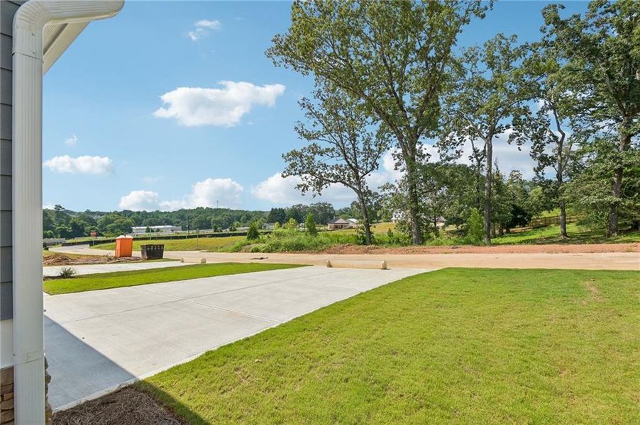 Exterior details and patio area of a home in Magnolia Trace, Flowery Branch (Image 3).