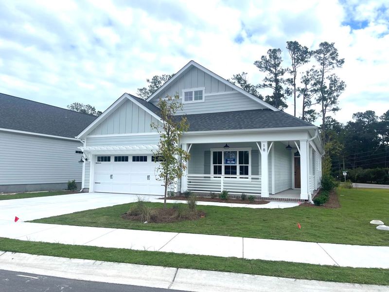 Representative exterior photo of a completed home built from the Jamestown by Bill Clark Homes in Osprey Landing, Southport, NC (Image 9).