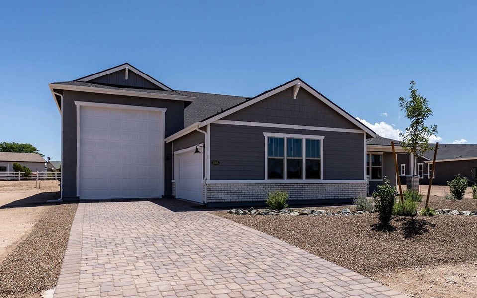 Front exterior of a new home in Heritage Pointe, Chino Valley, AZ, highlighting curb appeal (Image 2).
