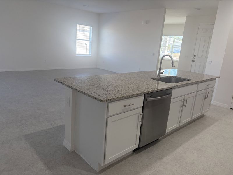 Furnished interior view inside a new home in Burnt Store Village, Punta Gorda (Image 3).