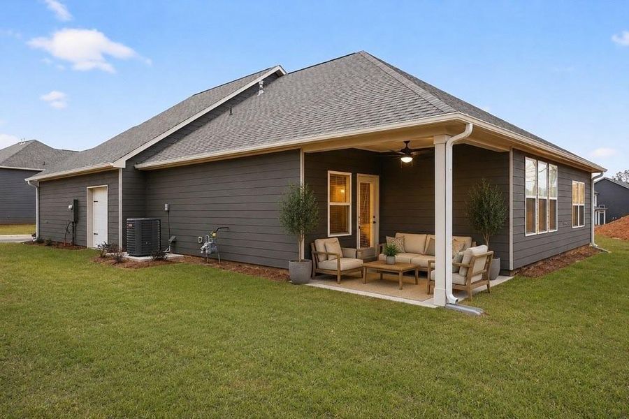 Exterior details and patio area of a home in The Fairways at Mirror Lake, Villa Rica (Image 26).