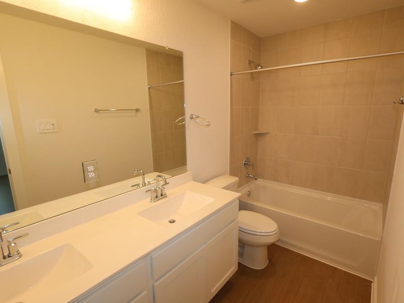 Furnished interior view inside a new home in Sorella, Tomball (Image 5).