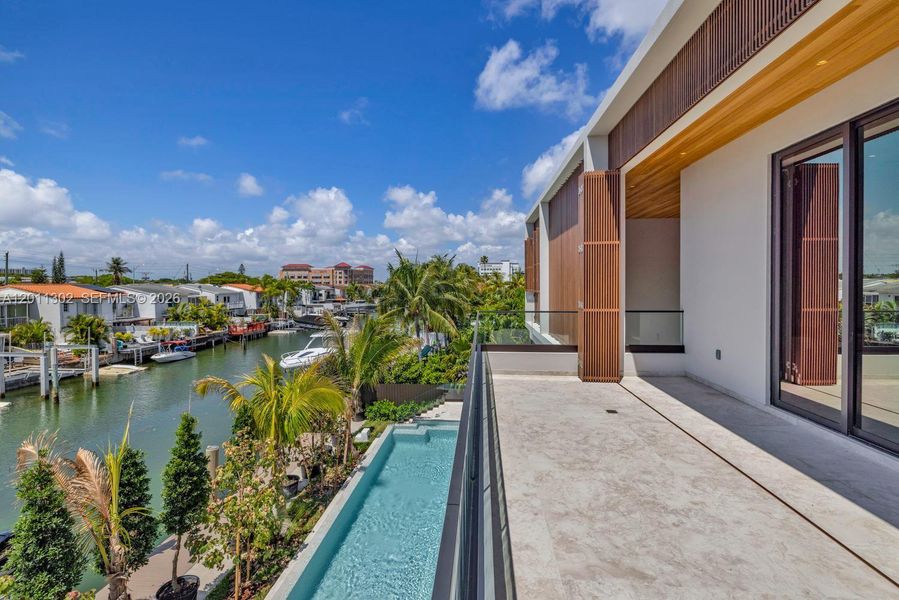 Exterior details and patio area of a home in , North Miami (Image 39).