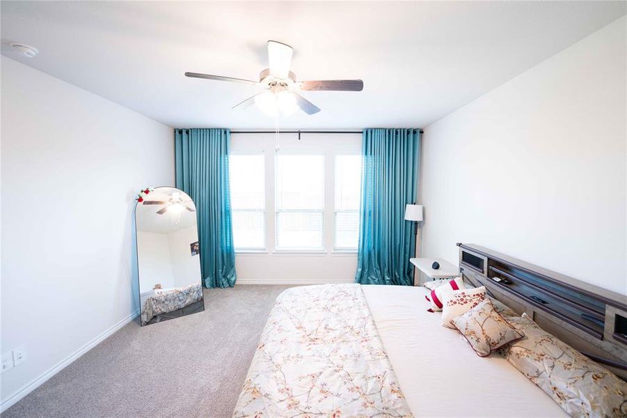 Bright interior space with light gray carpeting Bright interior space with light gray carpeting