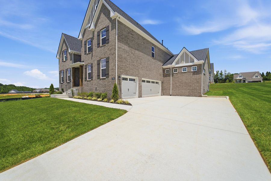 Front exterior of a new home in Aden Woods, Fairview, TN, highlighting curb appeal (Image 2).