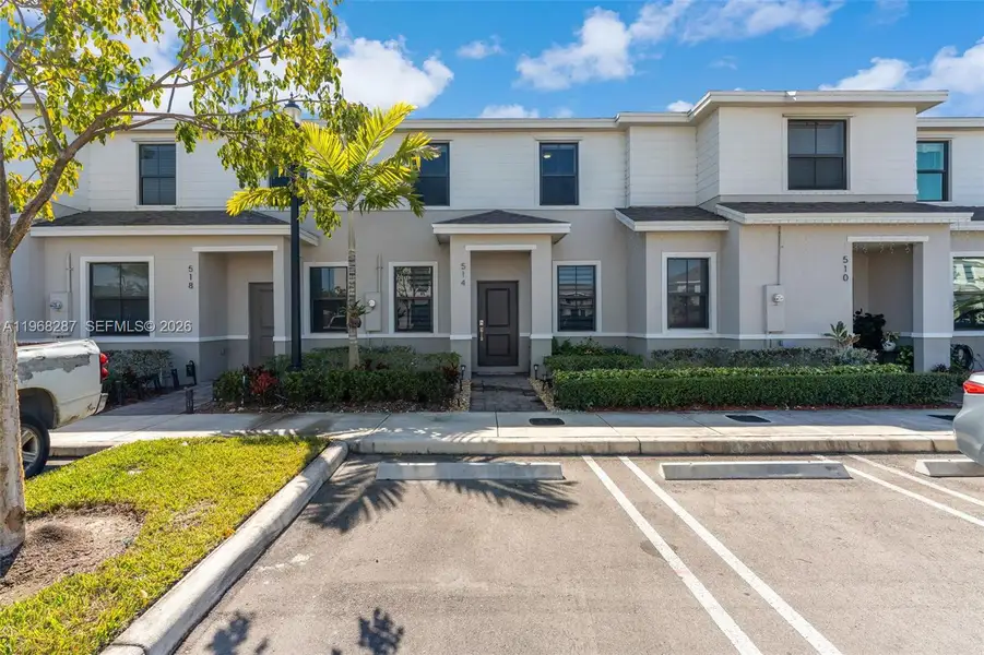Front exterior of a new home in , Florida City, FL, highlighting curb appeal (Image 2). Front exterior of a new home in , Florida City, FL, highlighting curb appeal (Image 2).