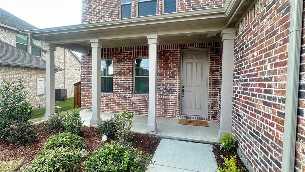 Front exterior of a new home in Gateway Parks, Forney, TX, highlighting curb appeal (Image 20). Front exterior of a new home in Gateway Parks, Forney, TX, highlighting curb appeal (Image 20).