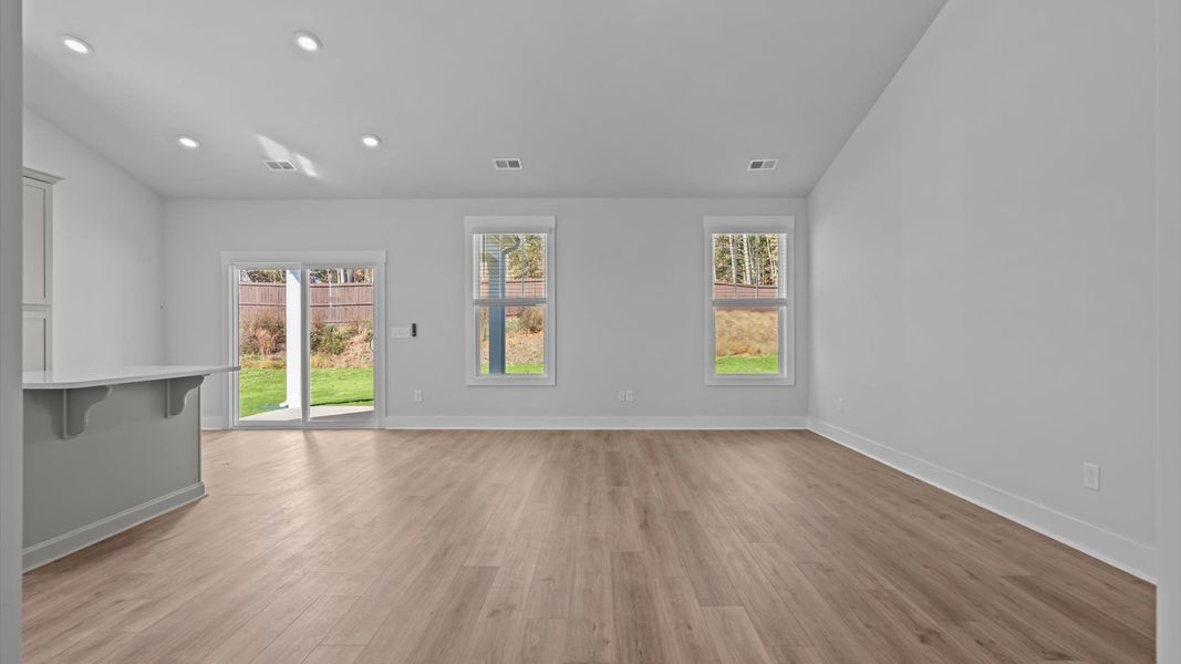 Highly functional family room with established charm and current styling in a reputable community