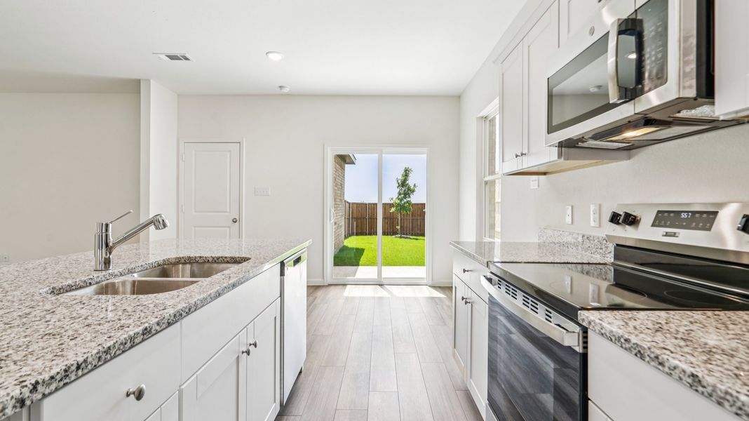 Representative furnished interior of a home built from the Jupiter by Starlight Homes in Castlewood South, Taylor (Image 4). Representative furnished interior of a home built from the Jupiter by Starlight Homes in Castlewood South, Taylor (Image 4).