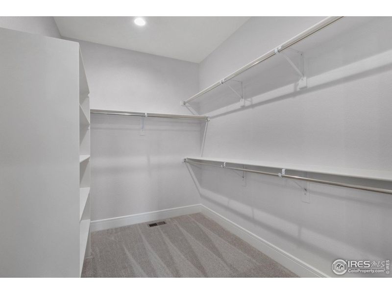 Spacious, unfurnished interior of a new home in Cottages at Kelly Farm, Greeley (Image 31).