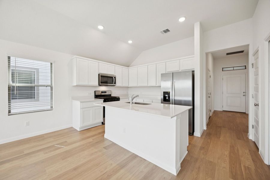 Kitchen in the Pinehurst home plan by Trophy Signature Homes - REPRESENTATIVE PHOTO Kitchen in the Pinehurst home plan by Trophy Signature Homes - REPRESENTATIVE PHOTO