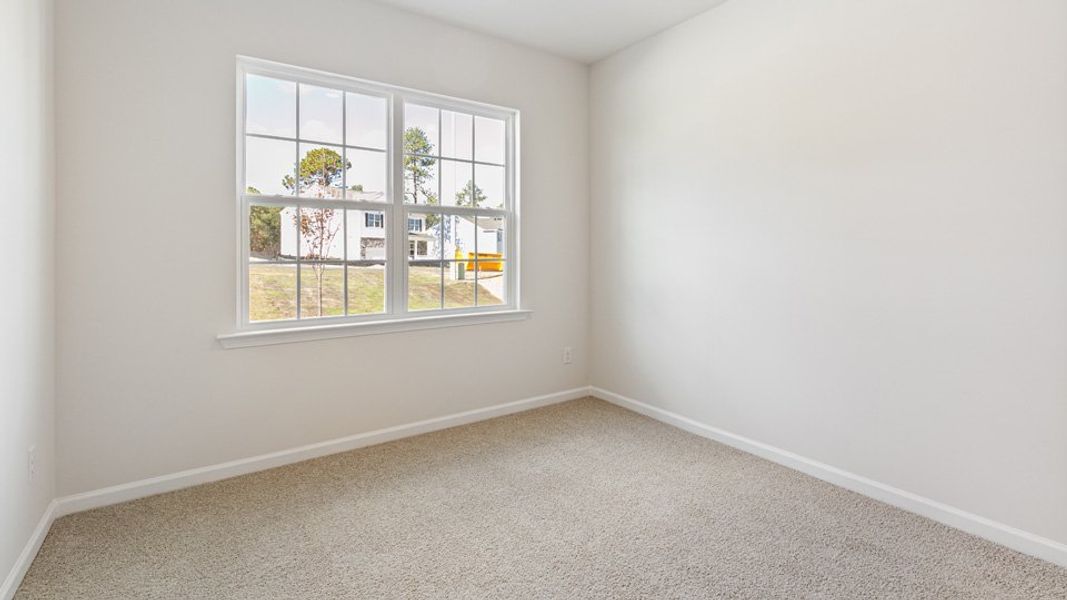 Representative unfurnished interior of a home built from the Booth by D.R. Horton in River Stone, Elm City (Image 7).