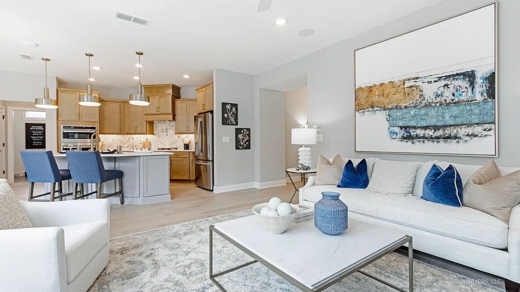 Furnished interior view inside a new home in The Courtyards at Bailey Farm, Dacula (Image 4).