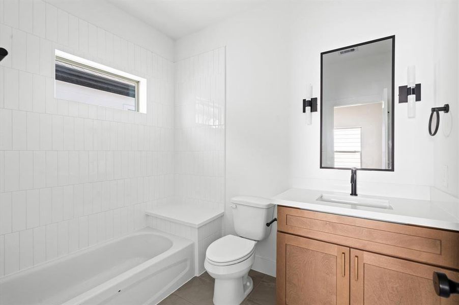 Chic third-floor full bath with modern fixtures and a bright, sophisticated design.