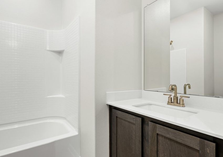 The secondary bathroom has a sprawling vanity space. The secondary bathroom has a sprawling vanity space.