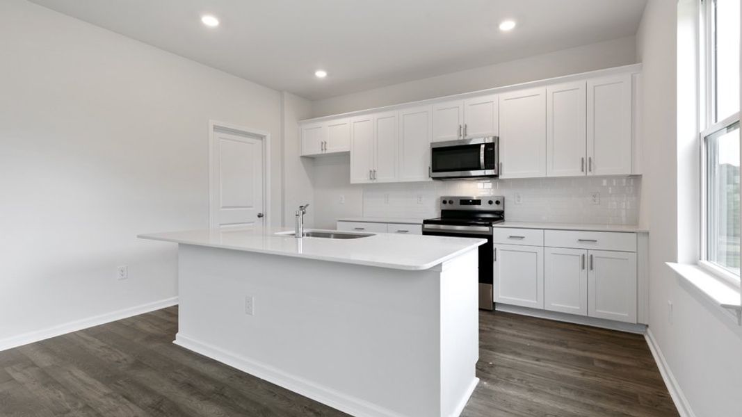 Furnished interior view inside a new home in Villa Grande, Winterville (Image 7).