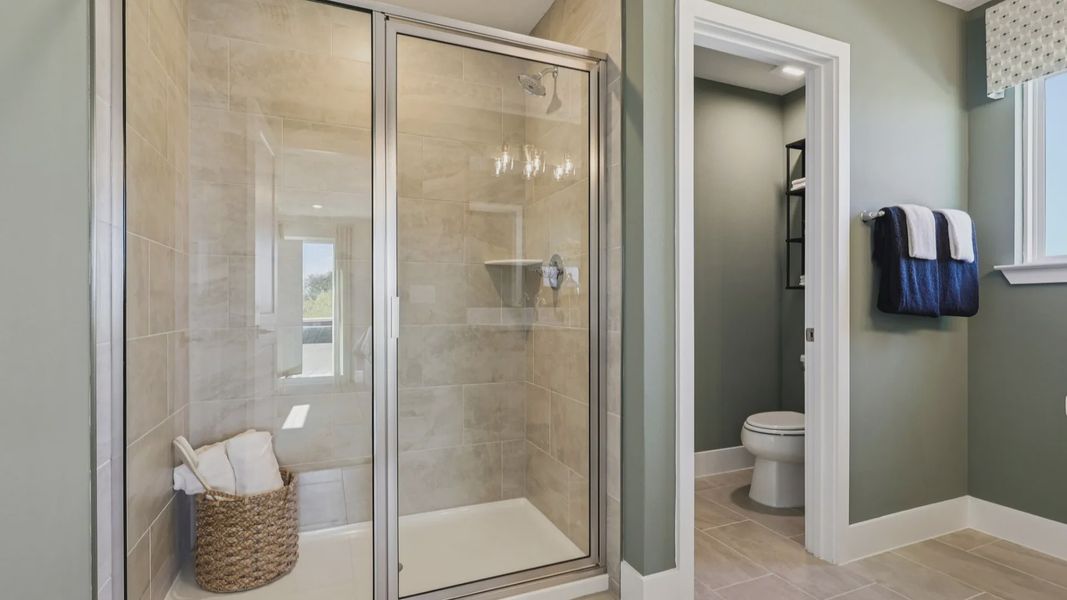The Mangrove Model Primary Bath with Walk-in Shower at Lakeside at Satilla by DRB Homes in Saint Cloud, FL The Mangrove Model Primary Bath with Walk-in Shower at Lakeside at Satilla by DRB Homes in Saint Cloud, FL