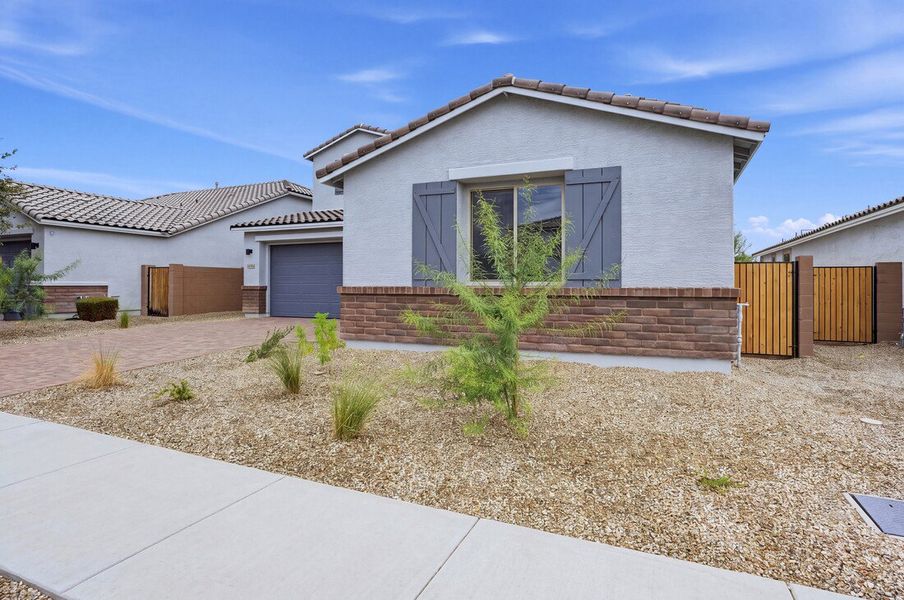 Exterior details and patio area of a home in Rancho Mercado, Surprise (Image 21).
