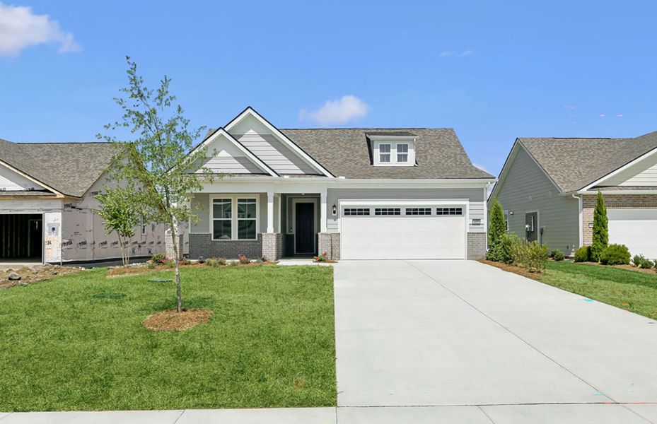 Front exterior of a new home in Del Webb Southern Harmony, Murfreesboro, TN, highlighting curb appeal (Image 26).