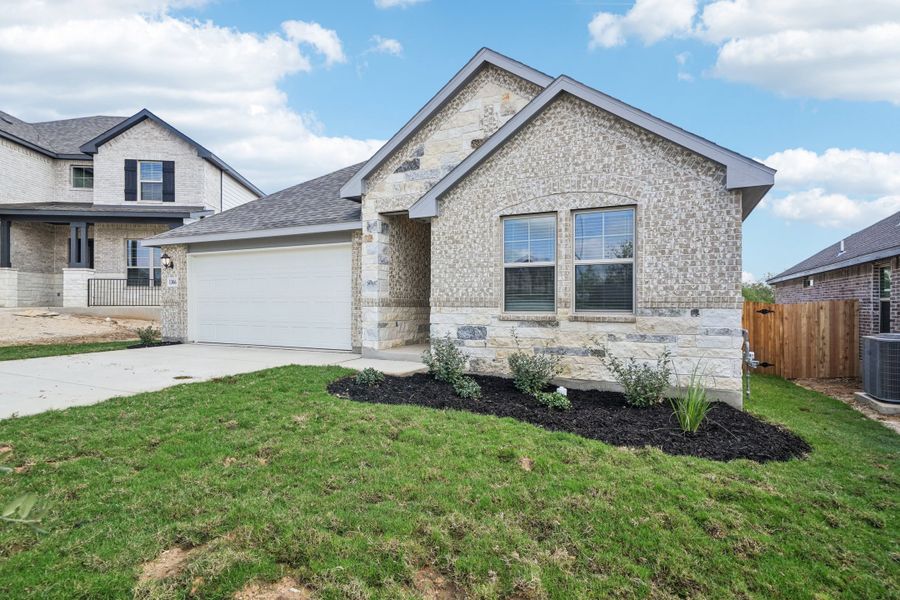 Front exterior of the Preston floorplan at a Meritage Homes community.