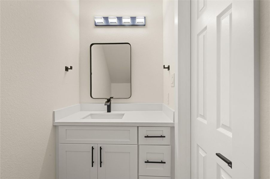 Half bathroom downstairs Half bathroom downstairs